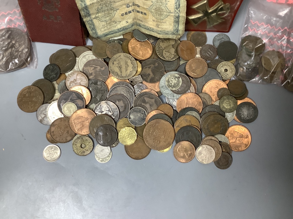 A German 1913-1914 Iron Cross 2nd Class, a Lusitania medallion and a collection of miscellaneous coins and tokens